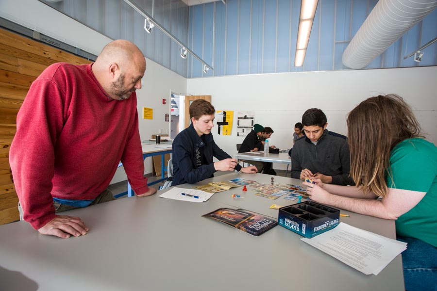 Tim Stedman working with students in Interactive Design