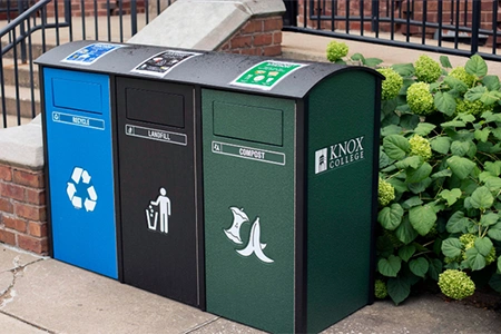 Three bins on campus: recycle, waste, and compost