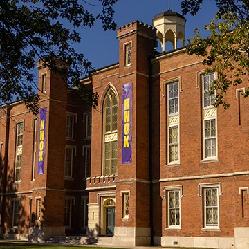The south side of Knox College's Old Main in the summer sun.