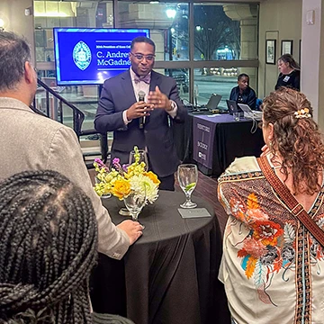 President C. Andrew McGadney talks to a group of alums at the Atlanta Venture Boldly event.